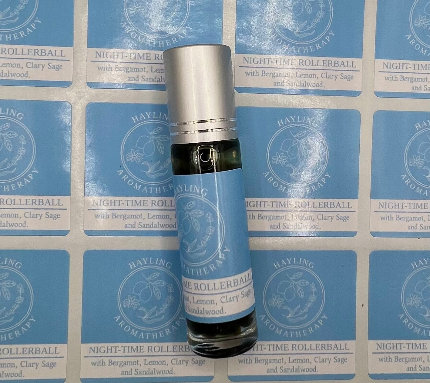 Aromatherapy sleep / insomnia support rollerball with essential oils of Sandalwood, Clary Sage, Lemon and Bergamot .