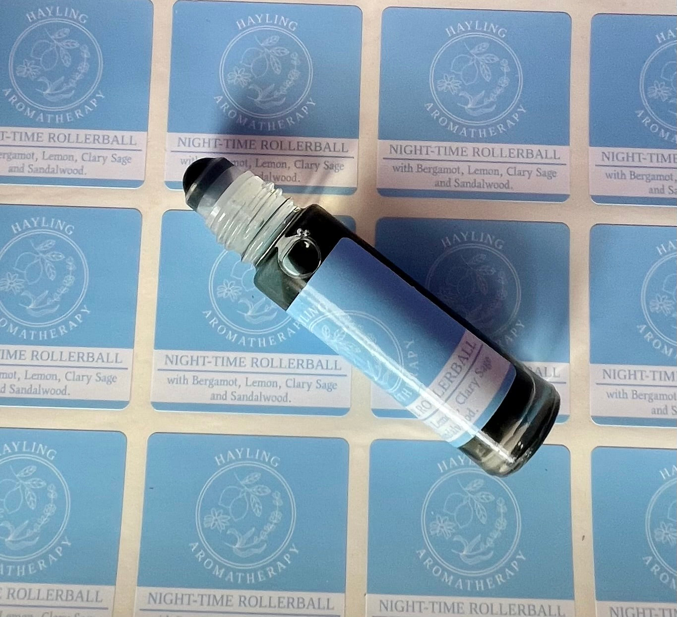 Aromatherapy sleep / insomnia support rollerball with essential oils of Sandalwood, Clary Sage, Lemon and Bergamot .