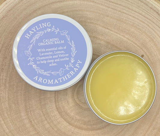 Organic aromatherapy calming balm made with essential oils of lavender lemon chamomile vetiver & natural oils and butters.