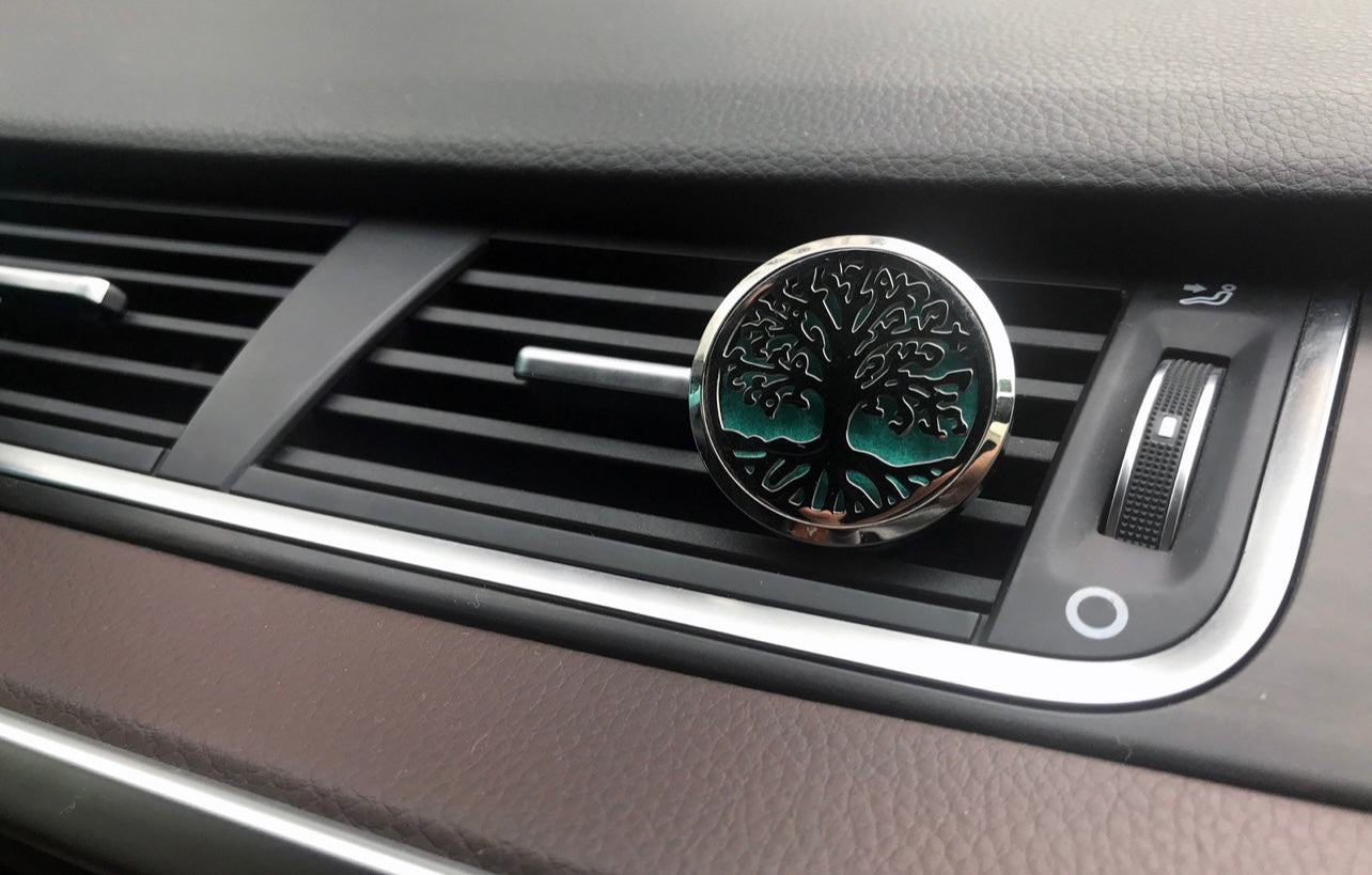 Tree of life aromatherapy car diffuser. With absorbent pad to drop on essential oils and inhale in the car.
