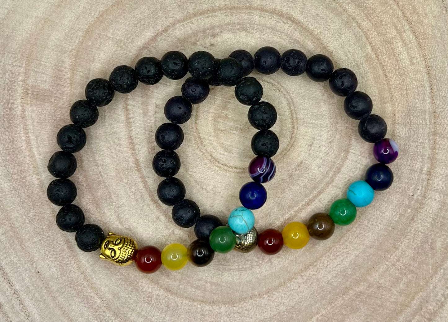 Personal / Lava bead aromatherapy bracelet. Absorbent volcanic rock beads with Buddha charm and chakra colour theme beads.