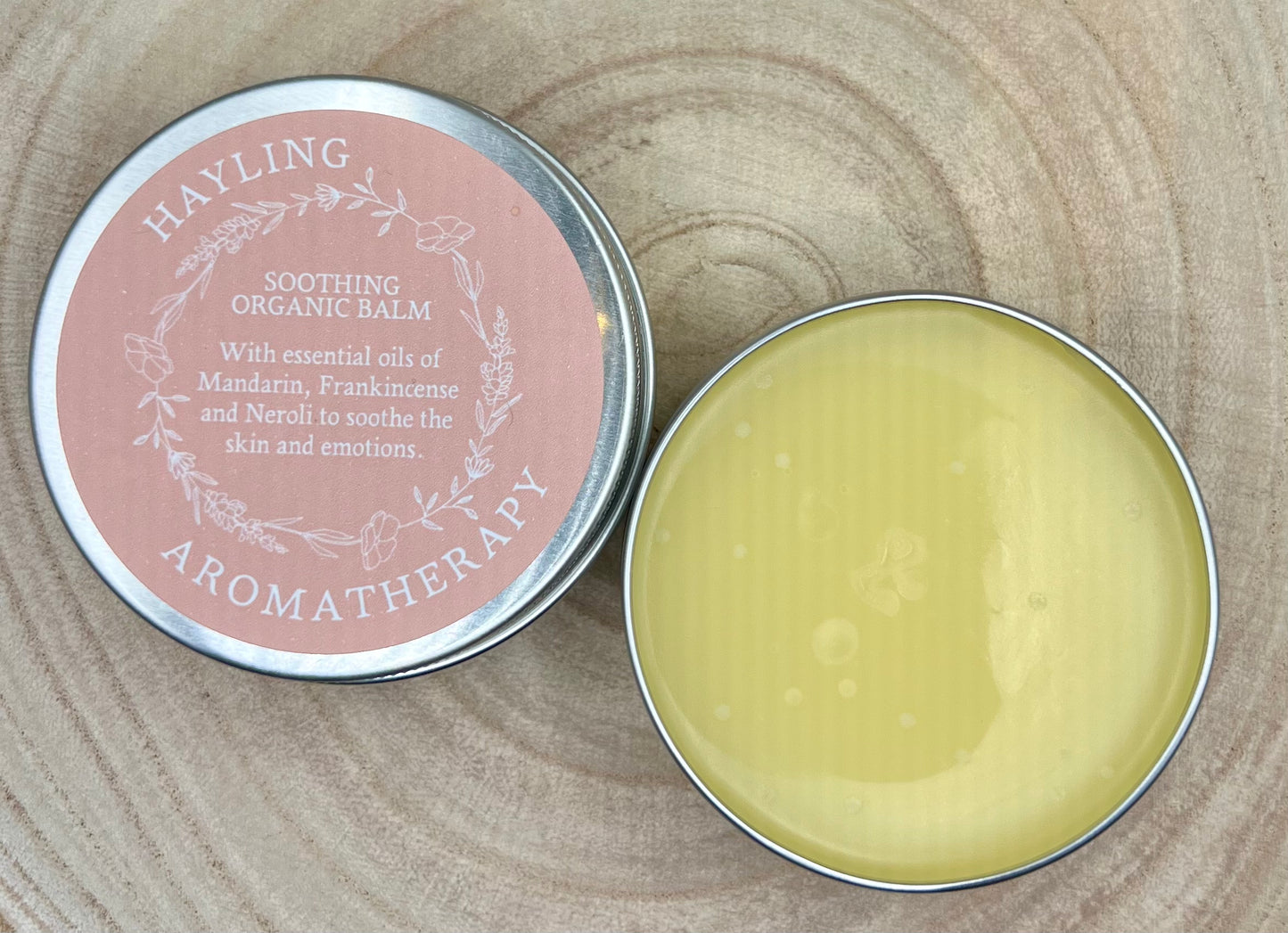 Organic aromatherapy soothing balm made with essential oils of mandarin, frankincense and neroli & natural oils and butters.