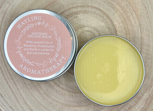 Organic aromatherapy soothing balm made with essential oils of mandarin, frankincense and neroli & natural oils and butters.