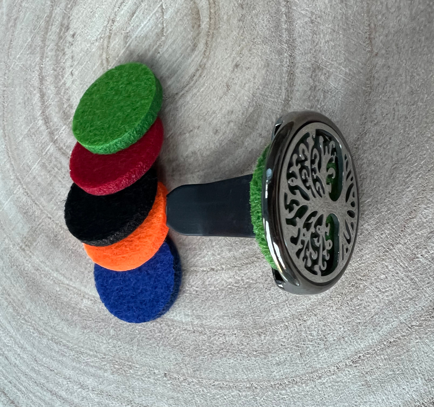 Tree of life aromatherapy car diffuser. With absorbent pad to drop on essential oils and inhale in the car.