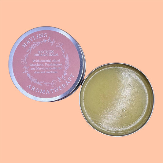 Organic aromatherapy soothing balm made with essential oils of mandarin, frankincense and neroli & natural oils and butters.
