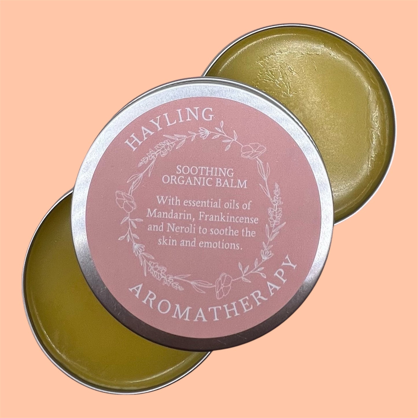 Organic aromatherapy soothing balm made with essential oils of mandarin, frankincense and neroli & natural oils and butters.