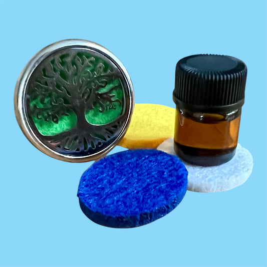 Tree of life aromatherapy car diffuser. With absorbent pad to drop on essential oils and inhale in the car.